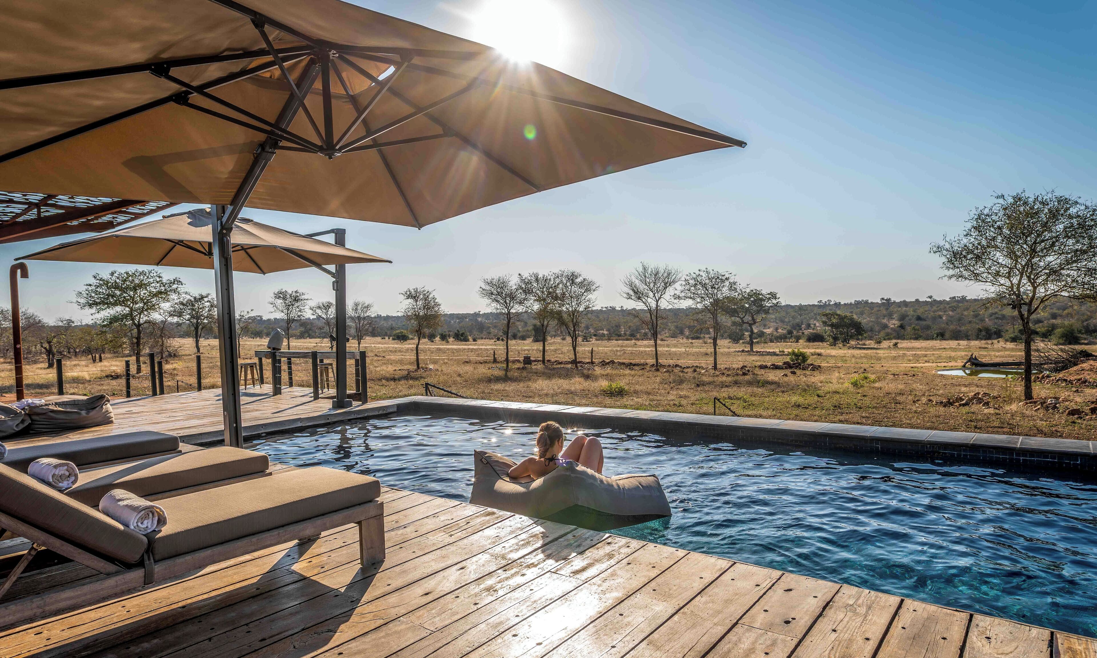 Outdoor pool, pool umbrellas, sun loungers