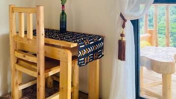 Desk, laptop workspace, blackout drapes, iron/ironing board