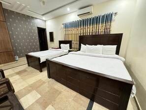 Deluxe Triple Room | Soundproofing, iron/ironing board, free WiFi - Millat Guest House G9-4 (Islamabad)