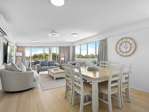 Deluxe Apartment, 3 Bedrooms, Balcony, Partial Ocean View | Living area | Flat-screen TV - Riviera Resort Hervey Bay (Torquay)