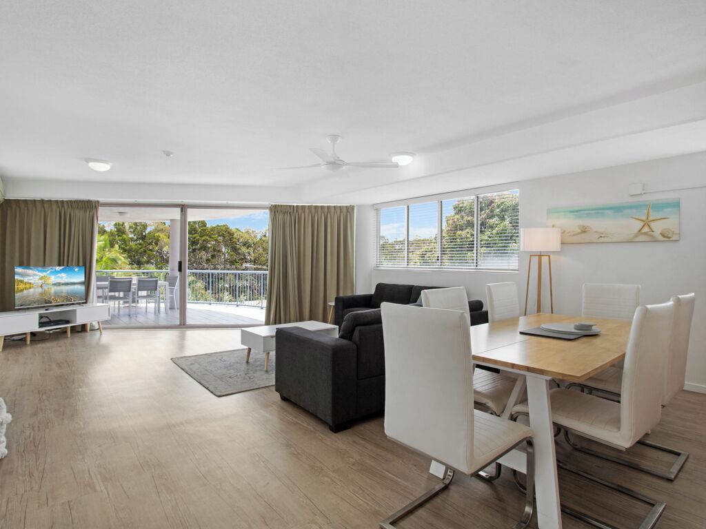 Deluxe Apartment, 3 Bedrooms, Balcony, Partial Ocean View | Living area | 40-cm Smart TV with satellite channels