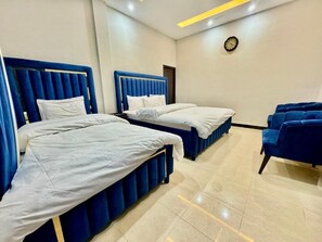 Deluxe Triple Room | Soundproofing, iron/ironing board, free WiFi - Millat Hotel G9-1 (Islamabad)