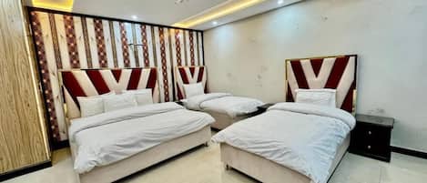 Chambre Exécutive | Chambres insonorisées, fer et planche à repasser, Wi-Fi gratuit