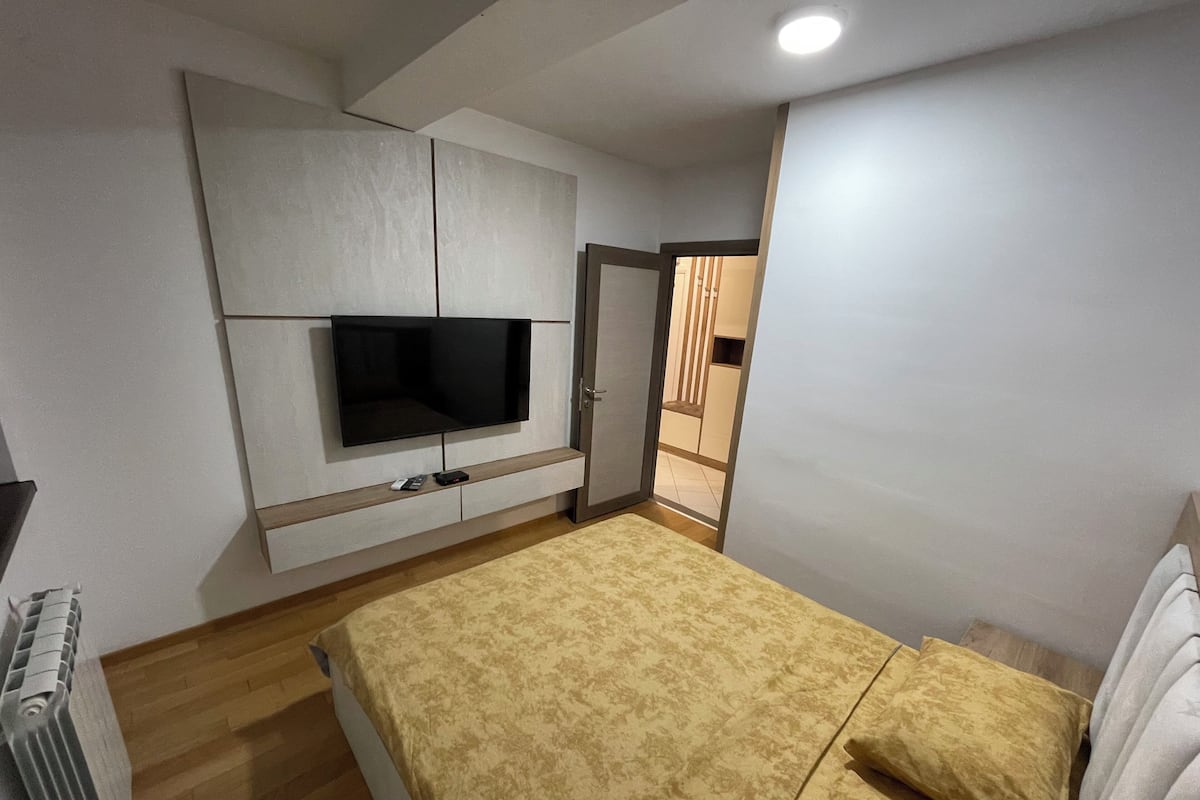 Deluxe Apartment, Balcony | 2 bedrooms, desk, laptop workspace, iron/ironing board