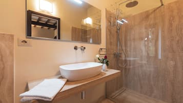 Hair dryer, towels, soap, shampoo