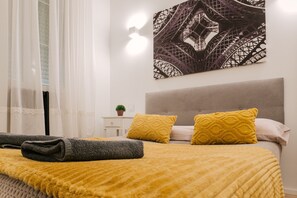 3 habitaciones, tabla de planchar con plancha, wifi y ropa de cama