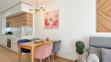 Deluxe-Apartment, Stadtblick | Wohnbereich