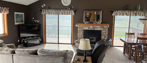 Smart TV, fireplace, books