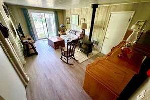 Living area - Charming 2-bedroom house with intimate Betsie River setting, AC, and WiFi (Thompsonville)