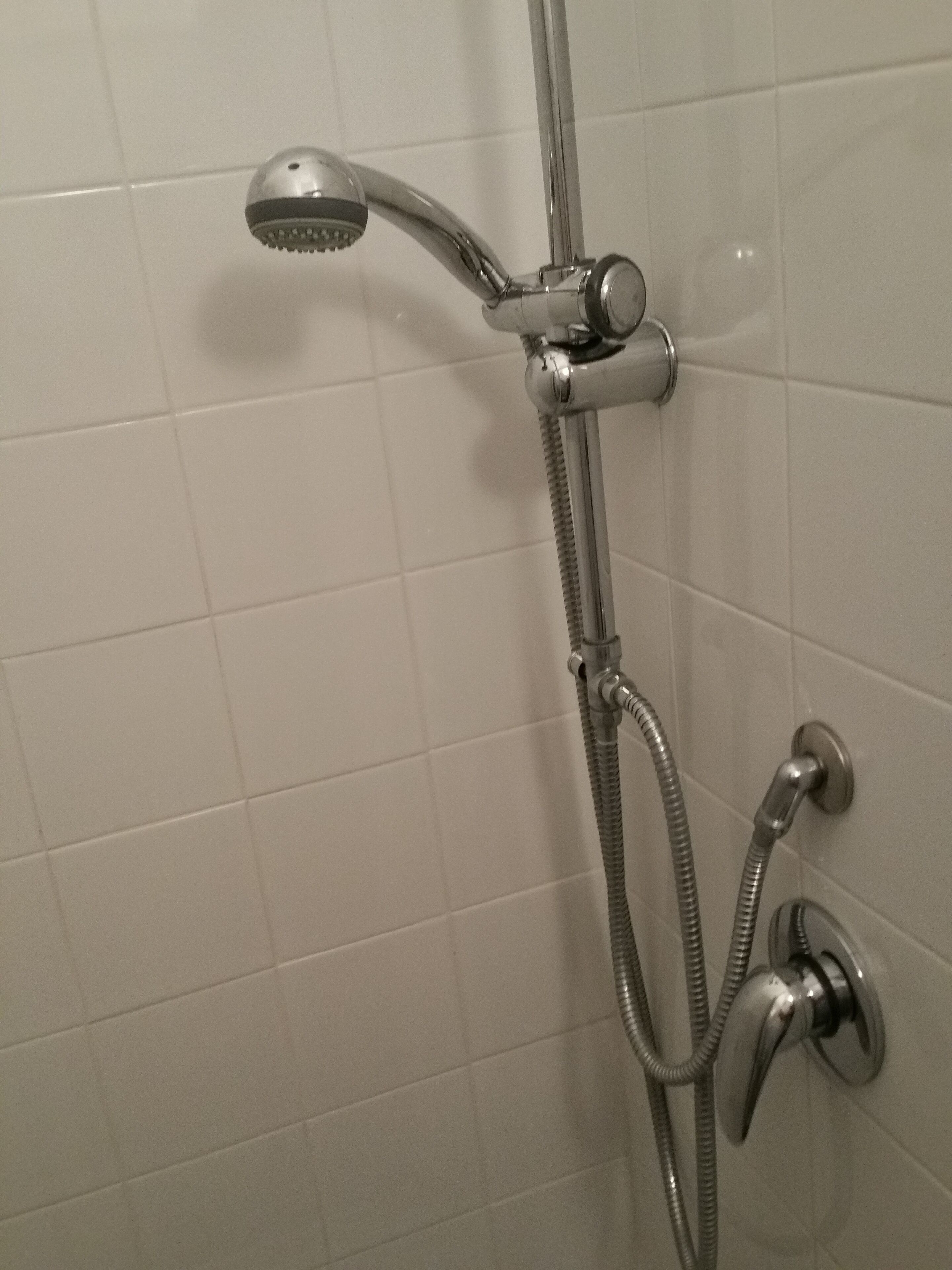 Dusj, håndklær, såpe og sjampo