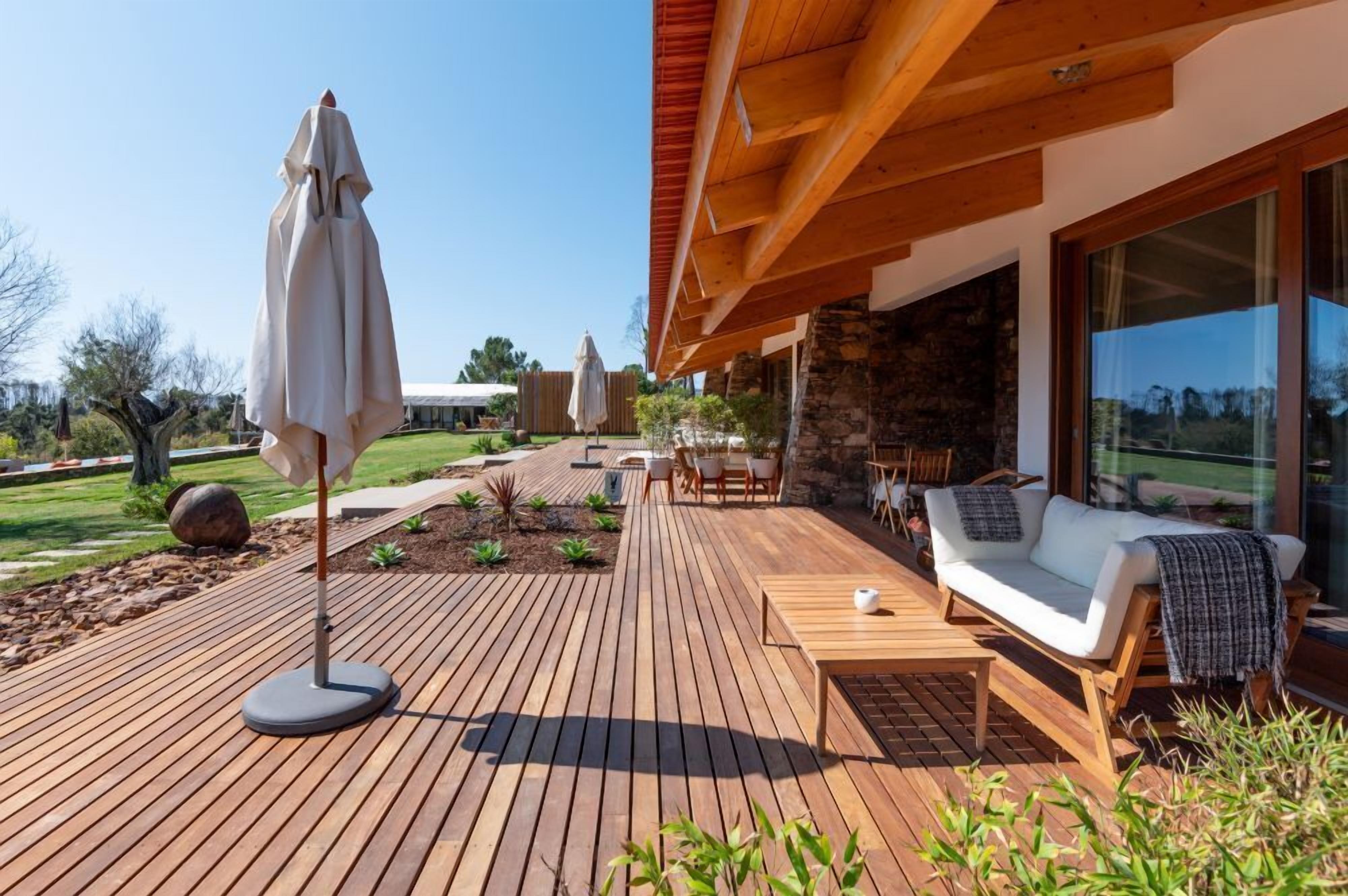 Deluxe Apartment, Pool View, Garden Area | Terrace/patio