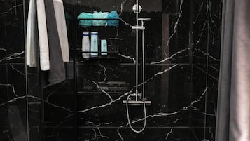 Separate tub and shower, deep soaking tub, hair dryer, towels
