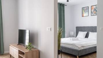 Apartment, 1 Bedroom, Balcony | 1 bedroom, iron/ironing board, free WiFi