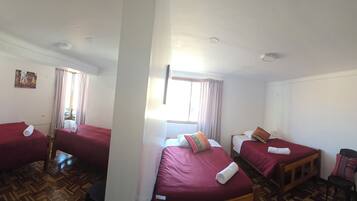 Comfort Quadruple Room | Down duvets, memory-foam beds, soundproofing, free WiFi