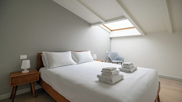 2 dormitorios, tabla de planchar con plancha, wifi gratis y ropa de cama