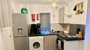 Apartment | Private kitchen | Fridge, microwave, oven, stovetop