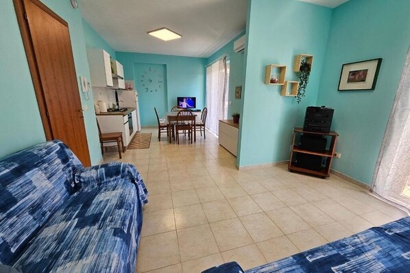 TV, DVD player, books, video library