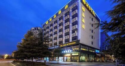 Xiushan V8 Boutique Hotel (Xiushan Railway Station Branch)