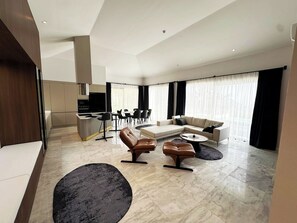 Deluxe villa, uitzicht op zee | Woonkamer