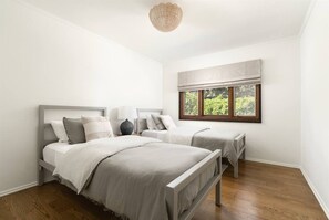 4 bedrooms, desk, iron/ironing board, travel cot