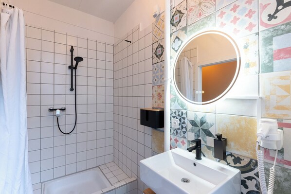 Standard Single Room | Bathroom | Shower, hair dryer, towels, soap