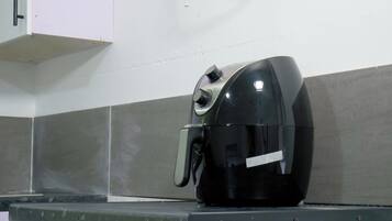 Mini-fridge, microwave, stovetop, cookware/dishes/utensils