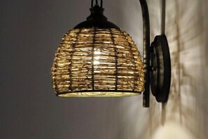 A hanging light fixture with a woven, cylindrical design. - Fengguan Mountain Meilu Village Inn (Yangshuo Yulong River Scenic Area) (Yangshuo)