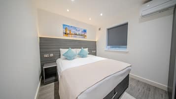 Luxury Apartment, Private Bathroom (One Bedroom) | Laptop workspace, iron/ironing board, free WiFi