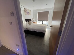 Apartament, bany privat (1 Bedroom) | 1 dormitori, habitacions insonoritzades i planxa i posts de planxar