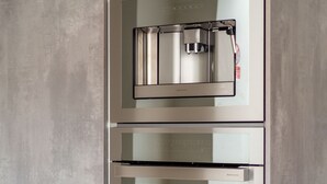 A stainless steel double oven with a built-in water dispenser. - Elegant 3Bedroom Retreat (London)