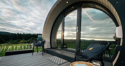 Luxury glamping pods with stunning views of the Scottish Highlands.