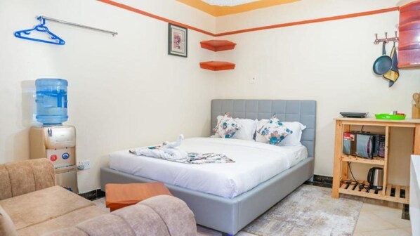 1 habitación, tabla de planchar con plancha, wifi y ropa de cama 