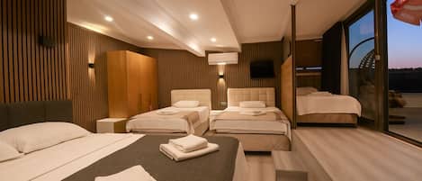 Family Room, Kitchenette, Sea View | 1 bedroom, soundproofing, free WiFi