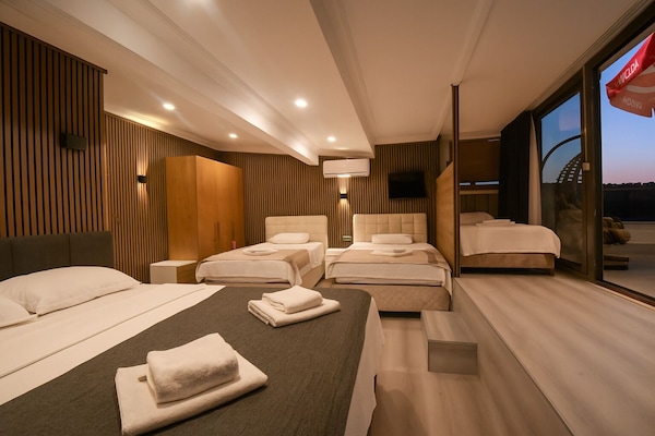 Quarto família, cozinha americana, vista para o mar | Quartos à prova de som, Wi-Fi de cortesia