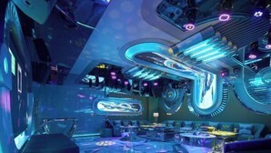 Un intérieur futuriste doté d’une structure circulaire centrale, d’espaces de détente et d’un éclairage d’ambiance.