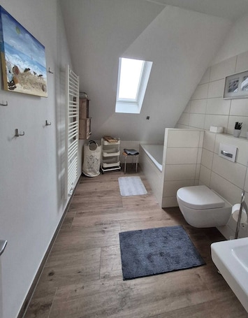Hair dryer, slippers, towels, soap. Ferienwohnung Thiele