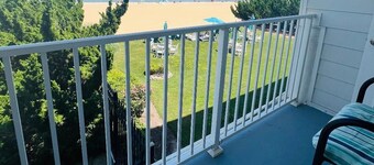 VB Oceanfront Condo at Boardwalk. See Dolphins from Balcony. Steps to Beach+Pool
