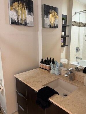 Hair dryer, towels, soap, shampoo