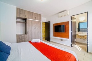 2 dormitorios, tabla de planchar con plancha, cuna de viaje y wifi