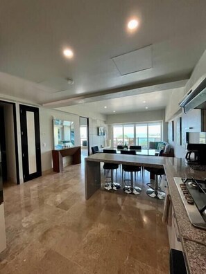 Fridge, coffee/tea maker, cookware/dishes/utensils