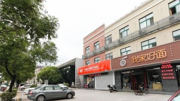 A building with a storefront and a closed shop.