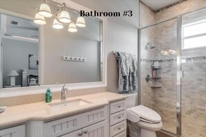 Shower, jetted bath, hair dryer, towels