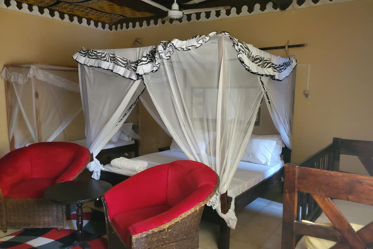 Family Triple Room, Balcony, Pool View | 1 bedroom, desk, laptop workspace, blackout drapes