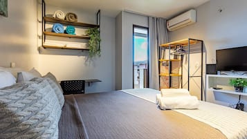 1 bedroom, desk, laptop workspace, blackout curtains