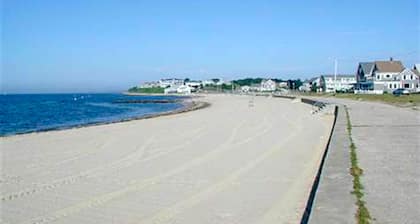 Spacious home near the beach with deck, W/D, AC, & central location