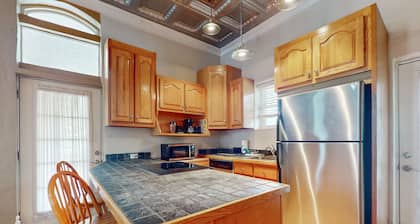 Relax riverside at this serene mountain getaway, complete with modern comfort.