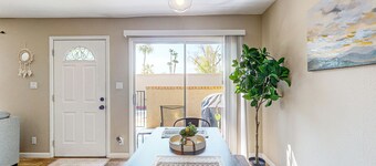 Modern townhome with pool, AC, W/D, grill, and private patio