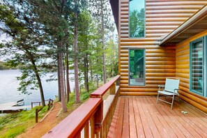 Terrace/patio - Picturesque Log Home with dock, fire pit,  pool table, & WIFI (St. Germain)