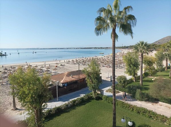 On the beach, sun-loungers