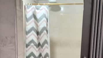 Shower, towels, soap, toilet paper